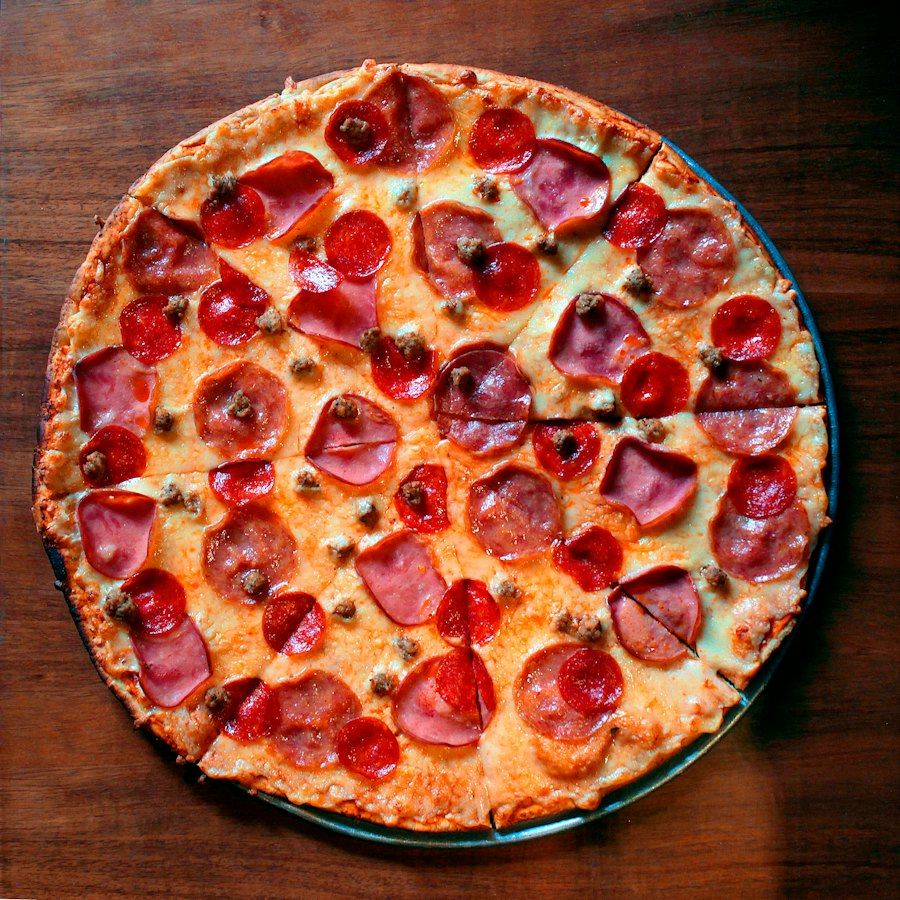 Pepperoni pizza on a wooden table